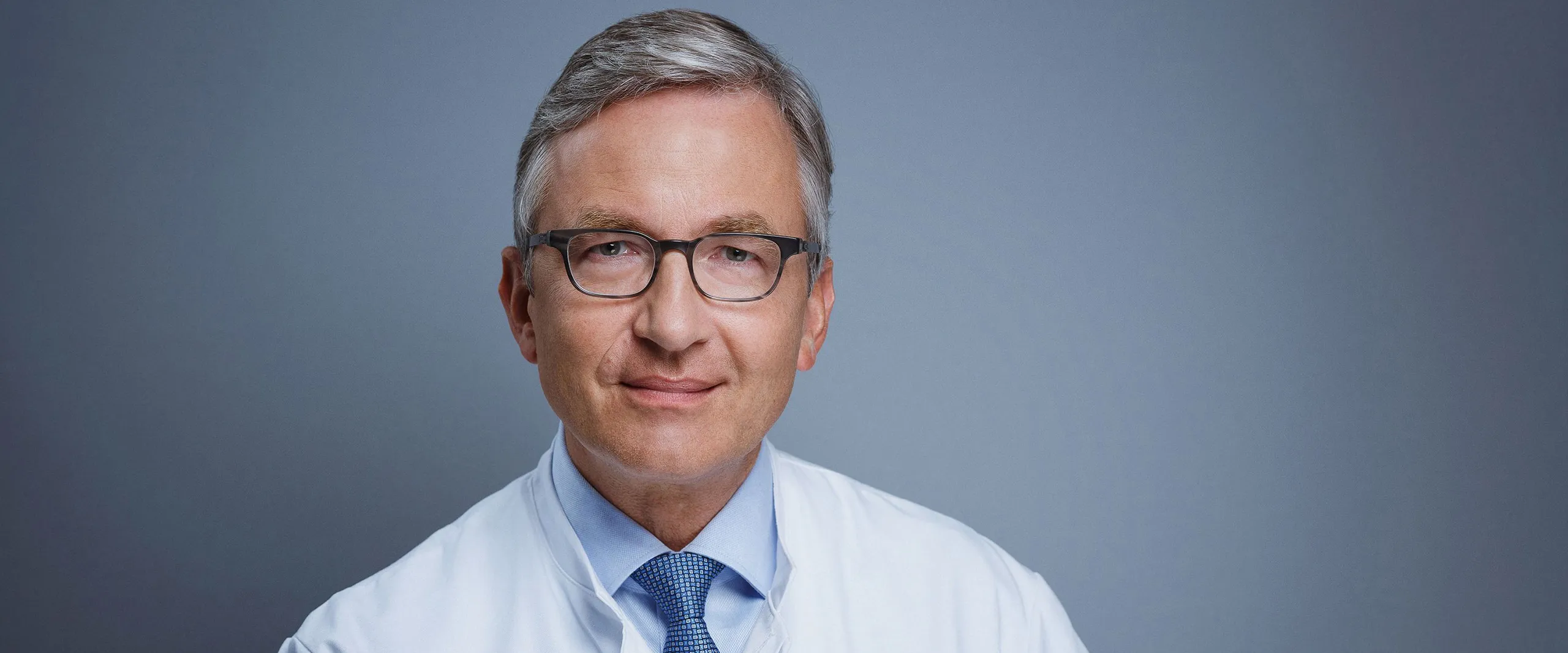 "Photo of Dr. Frank Holz."